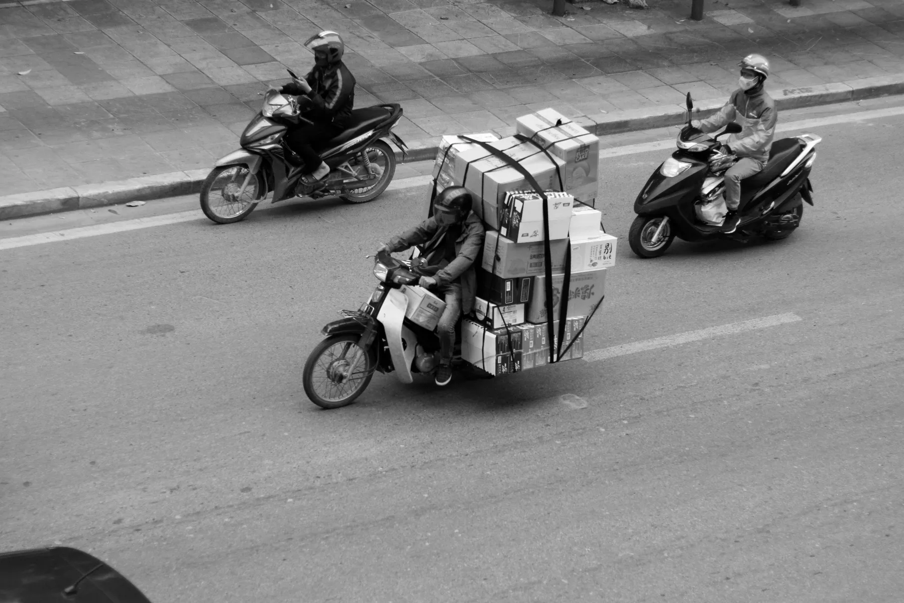 Photo of overloaded motorcycle courier